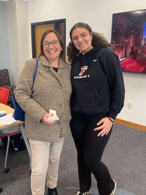 Dean McGowan with Raquel DeLeo, standing in the Innovation Lab during the finals event, Cram Jam